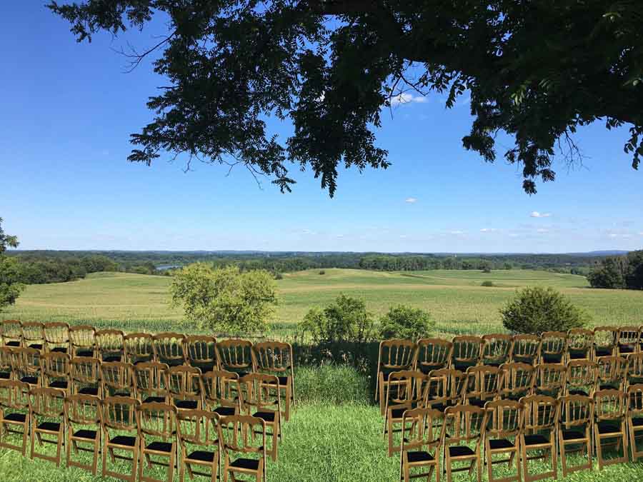 Wisconsin Wedding Venue - Vennebu Hill events barn in Wisconsin Dells - ceremony outside location and gold chateau chair